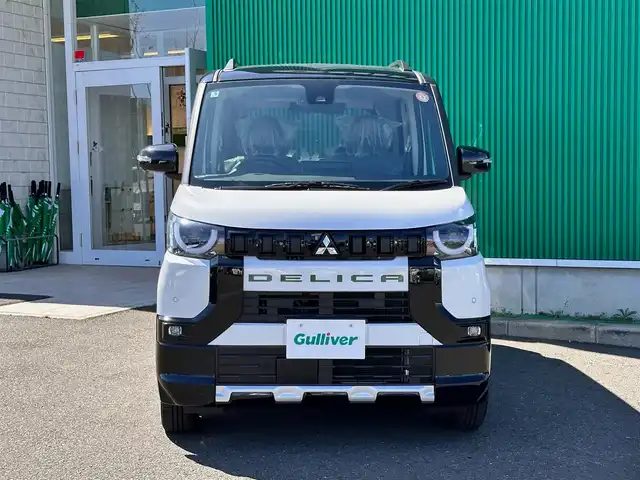 三菱 デリカミニ T プレミアム 宮城県 2025(令7)年 0.1千km アメジストブラック/シルキーホワイト T　PREMIUM　4WD　/CHAMONIXパッケージ/＝＝＝/e-Assist/・衝突被害軽減ブレーキ/・踏み間違い衝突防止アシスト/・車線逸脱警報システム/・車線逸脱防止支援機能/・オートマチックハイビーム/・ふらつき警報/・前方衝突予測警報/・標識検知システム/・先行車発進通知/マイパイロット（レーダークルーズコントロール/車線維持支援）/デジタルルームミラー/マルチアラウンドモニター/純正9型ディスプレイオーディオ/・Bluetooth/・AppleCarPlay/AndroidAuto/ハンズフリー両側パワースライドドア/ハーフレザーシート/シートヒーター/ステアリングヒーター/革巻きステアリング/ステアリングスイッチ/パドルシフト/電動パーキングブレーキ/ブレーキホールド/LEDヘッドランプ/フォグランプ/オートライト/スマートキー＆プッシュスタート/スペアキー/電動格納ミラー/ルーフレール/純正15インチAW/純正ラバーマット/W/サイド/カーテンエアバッグ