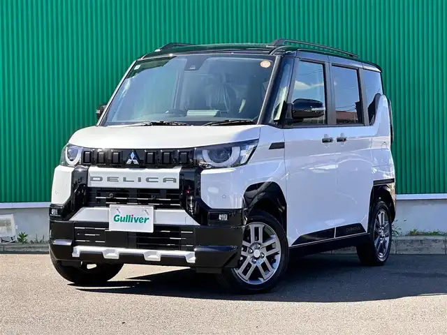 三菱 デリカミニ T プレミアム 宮城県 2025(令7)年 0.1千km アメジストブラック/シルキーホワイト T　PREMIUM　4WD　/CHAMONIXパッケージ/＝＝＝/e-Assist/・衝突被害軽減ブレーキ/・踏み間違い衝突防止アシスト/・車線逸脱警報システム/・車線逸脱防止支援機能/・オートマチックハイビーム/・ふらつき警報/・前方衝突予測警報/・標識検知システム/・先行車発進通知/マイパイロット（レーダークルーズコントロール/車線維持支援）/デジタルルームミラー/マルチアラウンドモニター/純正9型ディスプレイオーディオ/・Bluetooth/・AppleCarPlay/AndroidAuto/ハンズフリー両側パワースライドドア/ハーフレザーシート/シートヒーター/ステアリングヒーター/革巻きステアリング/ステアリングスイッチ/パドルシフト/電動パーキングブレーキ/ブレーキホールド/LEDヘッドランプ/フォグランプ/オートライト/スマートキー＆プッシュスタート/スペアキー/電動格納ミラー/ルーフレール/純正15インチAW/純正ラバーマット/W/サイド/カーテンエアバッグ