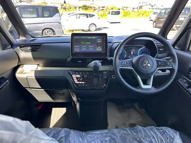 三菱 デリカミニ T プレミアム 宮城県 2025(令7)年 0.1千km アメジストブラック/シルキーホワイト T　PREMIUM　4WD　/CHAMONIXパッケージ/＝＝＝/e-Assist/・衝突被害軽減ブレーキ/・踏み間違い衝突防止アシスト/・車線逸脱警報システム/・車線逸脱防止支援機能/・オートマチックハイビーム/・ふらつき警報/・前方衝突予測警報/・標識検知システム/・先行車発進通知/マイパイロット（レーダークルーズコントロール/車線維持支援）/デジタルルームミラー/マルチアラウンドモニター/純正9型ディスプレイオーディオ/・Bluetooth/・AppleCarPlay/AndroidAuto/ハンズフリー両側パワースライドドア/ハーフレザーシート/シートヒーター/ステアリングヒーター/革巻きステアリング/ステアリングスイッチ/パドルシフト/電動パーキングブレーキ/ブレーキホールド/LEDヘッドランプ/フォグランプ/オートライト/スマートキー＆プッシュスタート/スペアキー/電動格納ミラー/ルーフレール/純正15インチAW/純正ラバーマット/W/サイド/カーテンエアバッグ