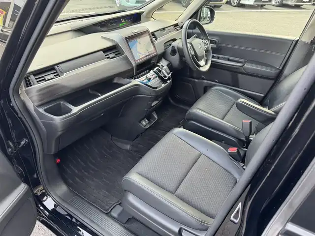 ホンダ フリード ハイブリット G ホンダセンシング 愛媛県 2020(令2)年 6.4万km クリスタルブラックパール ホンダセンシング/プッシュスタート/純正8インチナビ（CD/DVD/フルセグTV/Bluetooth/SD)/バックカメラ/ETC/両側パワースライドドア/オートライト/スマートキー/LEDヘッドライト/純正アルミホイール