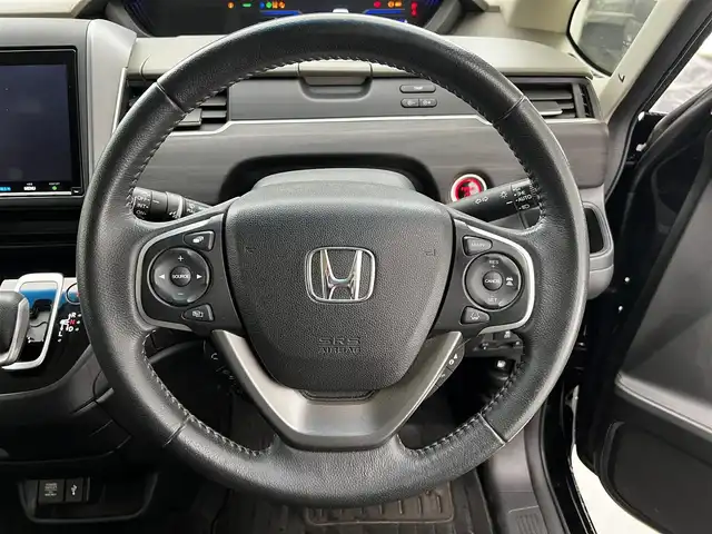 ホンダ フリード ハイブリット G ホンダセンシング 滋賀県 2020(令2)年 6.4万km クリスタルブラックパール 純正9インチナビ/ＣＤ/DVD/USB/Bluetooth/フルセグテレビ/バックカメラ/ホンダセンシング/両側パワースライドドア/ハーフレザーシート/LEDヘッドライト/オートライト/プッシュスタート/スマートキー/純正フロアマット