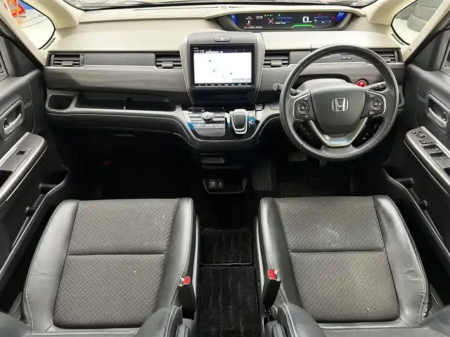 ホンダ フリード ハイブリット G ホンダセンシング 滋賀県 2020(令2)年 6.4万km クリスタルブラックパール 純正9インチナビ/ＣＤ/DVD/USB/Bluetooth/フルセグテレビ/バックカメラ/ホンダセンシング/両側パワースライドドア/ハーフレザーシート/LEDヘッドライト/オートライト/プッシュスタート/スマートキー/純正フロアマット