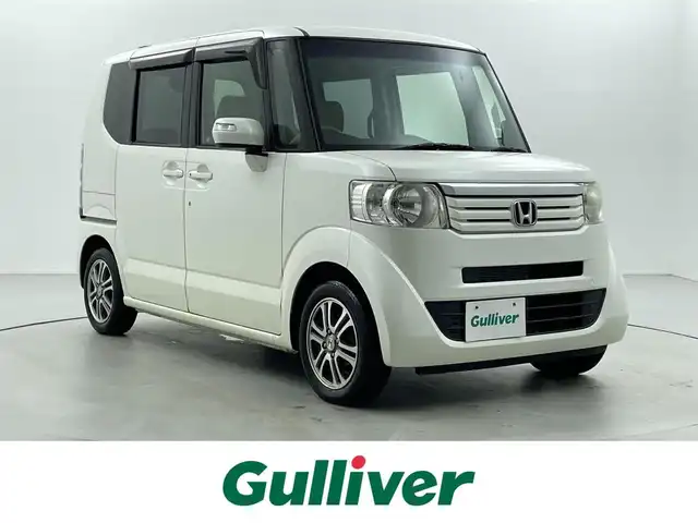ホンダ Ｎ ＢＯＸ G Lパッケージ 福井県 2013(平25)年 10.6万km プレミアムホワイトパール 社外SDナビ/片側電動ドア/社外ETC/純正アルミホイール/スマートキー/プッシュスタート/ヘッドライトレベライザー/純正フロアマット/ACC/横滑り防止装置/純正キセノンヘッドライト/電動格納ミラー