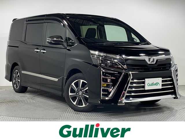 トヨタ ヴォクシー ZS 煌Ⅱ 広島県 2019(令1)年 6万km ブラック 禁煙車/ＡＬＰＩＮＥ１１型ナビ/１２．８型後席フリップダウンモニター/バックカメラ/両側パワースライドドア/クルーズコントロール/ＨＤＭＩ/オートマチックハイビーム/ＥＴＣ/ＭＴモード付ＡＴシフト/ＬＥＤヘッドライト/衝突被害軽減/レーンキープアシスト/踏み間違い防止/純正16インチアルミホイール(205/60/R16)/エアバッグ(運転席/助手席)