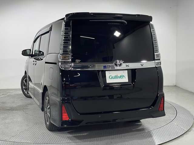 トヨタ ヴォクシー ZS 煌Ⅱ 広島県 2019(令1)年 6万km ブラック 禁煙車/ＡＬＰＩＮＥ１１型ナビ/１２．８型後席フリップダウンモニター/バックカメラ/両側パワースライドドア/クルーズコントロール/ＨＤＭＩ/オートマチックハイビーム/ＥＴＣ/ＭＴモード付ＡＴシフト/ＬＥＤヘッドライト/衝突被害軽減/レーンキープアシスト/踏み間違い防止/純正16インチアルミホイール(205/60/R16)/エアバッグ(運転席/助手席)