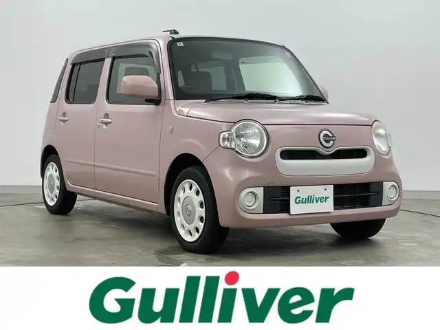 ダイハツ ミラ ココア X 岡山県 2016(平28)年 4.8万km ムースピンクパール 社外ＳＤナビ【MDV-D502BT】/（フルセグ／Ｂｌｕｅｔｏｏｔｈ／ＦＭ・ＡＭ／ＵＳＢ　）/純正フロアマット/スマートキー　/アイドリングストップ　/横滑り防止装置　/ヘッドライトレベライザー　/電格ミラー　/ミュージックサーバー/ミュージックプレイヤー/ＡＣＣ/純正ホイールキャップ