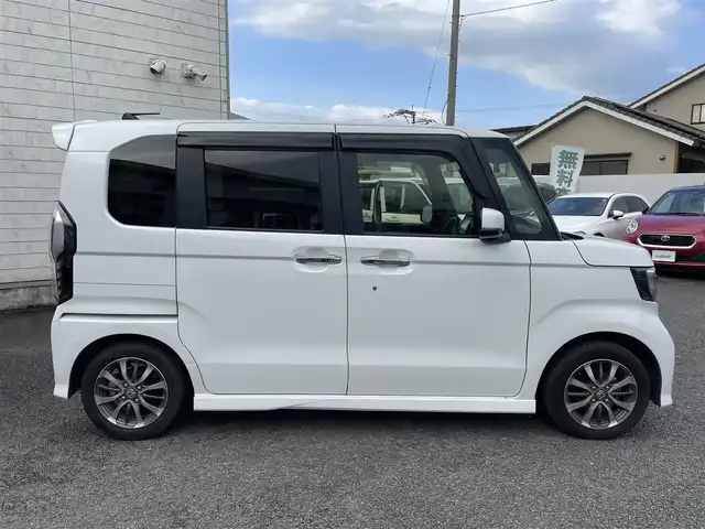 ホンダ Ｎ ＢＯＸ カスタム L 大分県 2021(令3)年 2.1万km プラチナホワイトパール 〇純正メモリーナビ/　CD/DVD/フルセグ/BT/USB/〇バックカメラ/〇クリアランスソナー/〇横滑り防止/〇LKA/〇ホンダセンシング/〇ACC/〇ヘッドライトレベライザー/〇片側パワースライドドア/〇ステアリングスイッチ/〇フロアマット/〇ドアバイザー/〇プライバシーガラス/〇ウインカーミラー/〇ドライブレコーダー/〇保証書/〇取扱説明書/〇スペアキー