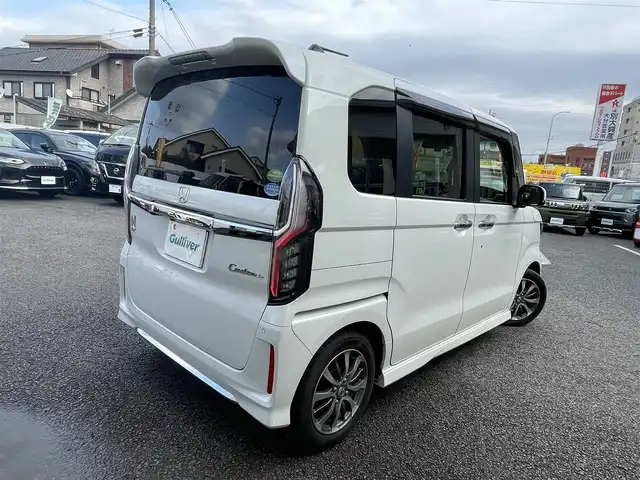 ホンダ Ｎ ＢＯＸ カスタム L 大分県 2021(令3)年 2.1万km プラチナホワイトパール 〇純正メモリーナビ/　CD/DVD/フルセグ/BT/USB/〇バックカメラ/〇クリアランスソナー/〇横滑り防止/〇LKA/〇ホンダセンシング/〇ACC/〇ヘッドライトレベライザー/〇片側パワースライドドア/〇ステアリングスイッチ/〇フロアマット/〇ドアバイザー/〇プライバシーガラス/〇ウインカーミラー/〇ドライブレコーダー/〇保証書/〇取扱説明書/〇スペアキー