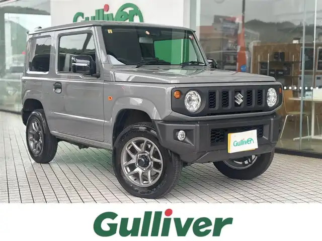 スズキ ジムニー XC 京都府 2023(令5)年 0.5万km ミディアムグレー ワンオーナー/スズキセーフティサポート/・デュアルセンサーブレーキサポート/・誤発進抑制機能/・車線逸脱警報機能/・ふらつき警報機能/・ハイビームアシスト/アルパイン9インチディスプレイオーディオ/・Apple carpray/Android auto/Bluetooth/バックカメラ/クルーズコントロール/ビルトインETC/前席シートヒーター/LEDヘッドランプ/純正16インチアルミホイール