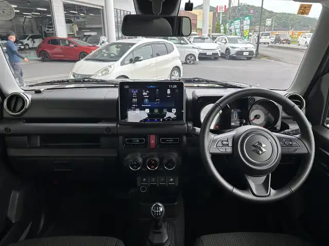 スズキ ジムニー XC 京都府 2023(令5)年 0.5万km ミディアムグレー ワンオーナー/スズキセーフティサポート/・デュアルセンサーブレーキサポート/・誤発進抑制機能/・車線逸脱警報機能/・ふらつき警報機能/・ハイビームアシスト/アルパイン9インチディスプレイオーディオ/・Apple carpray/Android auto/Bluetooth/バックカメラ/クルーズコントロール/ビルトインETC/前席シートヒーター/LEDヘッドランプ/純正16インチアルミホイール