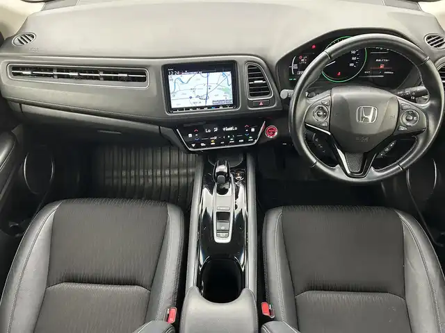 ホンダ ヴェゼル ハイブリッド Z ホンダセンシング 熊本県 2018(平30)年 4.9万km プレミアムクリスタルレッドM ワンオーナー/純正メモリーナビ（VXM-187VFEi)/（CD/DVD/Bluetooth/フルセグTV)/バックカメラ/ビルトインETC/ホンダセンシング/・CMBS/・レーンキープアシスト/・路外逸脱抑制システム/・先行車発進お知らせ/・標識認識機能/・アダプティブクルーズコントロール/ハーフレザーシート/前席シートヒーター/電動パーキングブレーキ/ブレーキホールド/パドルシフト/ステアリングスイッチ/純正１７インチアルミホイール/保証書/取扱説明書