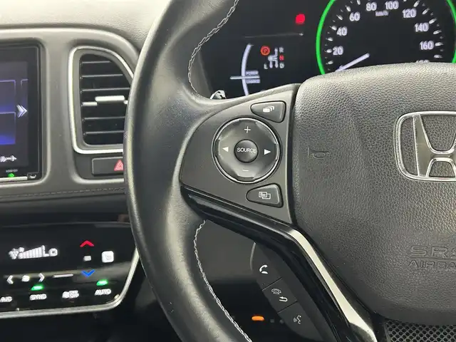 ホンダ ヴェゼル ハイブリッド Z ホンダセンシング 熊本県 2018(平30)年 4.9万km プレミアムクリスタルレッドM ワンオーナー/純正メモリーナビ（VXM-187VFEi)/（CD/DVD/Bluetooth/フルセグTV)/バックカメラ/ビルトインETC/ホンダセンシング/・CMBS/・レーンキープアシスト/・路外逸脱抑制システム/・先行車発進お知らせ/・標識認識機能/・アダプティブクルーズコントロール/ハーフレザーシート/前席シートヒーター/電動パーキングブレーキ/ブレーキホールド/パドルシフト/ステアリングスイッチ/純正１７インチアルミホイール/保証書/取扱説明書