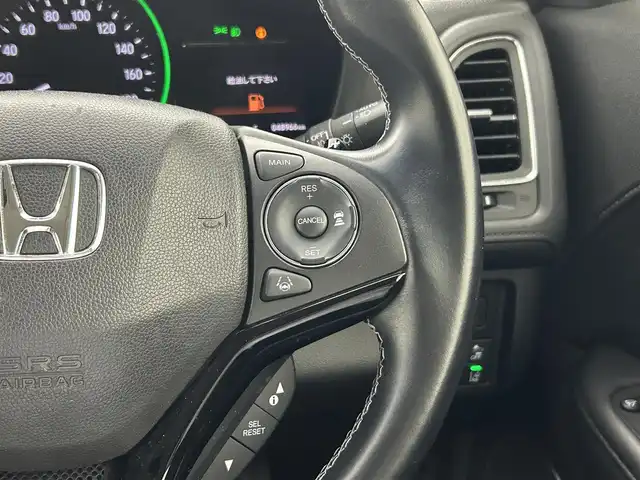 ホンダ ヴェゼル ハイブリッド Z ホンダセンシング 熊本県 2018(平30)年 4.9万km プレミアムクリスタルレッドM ワンオーナー/純正メモリーナビ（VXM-187VFEi)/（CD/DVD/Bluetooth/フルセグTV)/バックカメラ/ビルトインETC/ホンダセンシング/・CMBS/・レーンキープアシスト/・路外逸脱抑制システム/・先行車発進お知らせ/・標識認識機能/・アダプティブクルーズコントロール/ハーフレザーシート/前席シートヒーター/電動パーキングブレーキ/ブレーキホールド/パドルシフト/ステアリングスイッチ/純正１７インチアルミホイール/保証書/取扱説明書