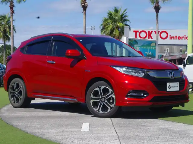 ホンダ ヴェゼル ハイブリッド Z ホンダセンシング 千葉県 2018(平30)年 4.9万km プレミアムクリスタルレッドM ワンオーナー/ホンダセンシング/・衝突軽減ブレーキ（CMBS）/・車線維持支援システム（LKAS）/・アダプティブクルーズコントロール（ACC）/・後方誤発進抑制機能/・誤発進抑制機能/ハーフレザーシート/純正メモリーナビ/地デジTV/【DVD/CD再生機能　Bluetooth接続】/バックカメラ/革巻きステアリング/ステアリングスイッチ/パドルシフト/ETC/LEDヘッドライト/フォグライト/ウインカーミラー/純正17インチアルミホイル/サイド/カーテンエアバッグ/Honda スマートキー