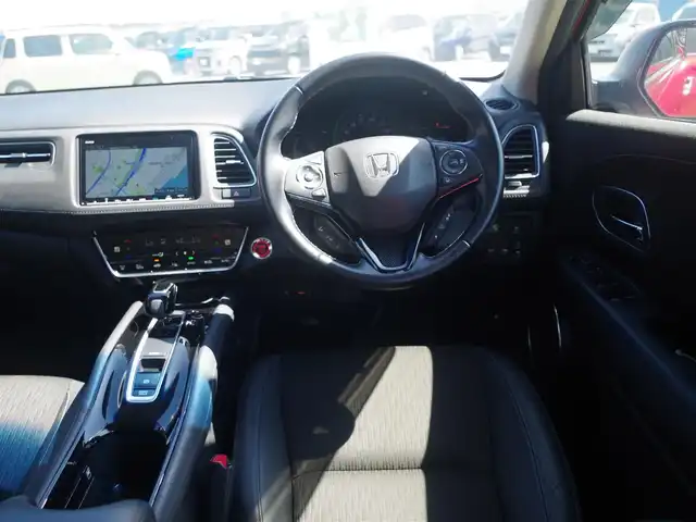 ホンダ ヴェゼル ハイブリッド Z ホンダセンシング 千葉県 2018(平30)年 4.9万km プレミアムクリスタルレッドM ワンオーナー/ホンダセンシング/・衝突軽減ブレーキ（CMBS）/・車線維持支援システム（LKAS）/・アダプティブクルーズコントロール（ACC）/・後方誤発進抑制機能/・誤発進抑制機能/ハーフレザーシート/純正メモリーナビ/地デジTV/【DVD/CD再生機能　Bluetooth接続】/バックカメラ/革巻きステアリング/ステアリングスイッチ/パドルシフト/ETC/LEDヘッドライト/フォグライト/ウインカーミラー/純正17インチアルミホイル/サイド/カーテンエアバッグ/Honda スマートキー