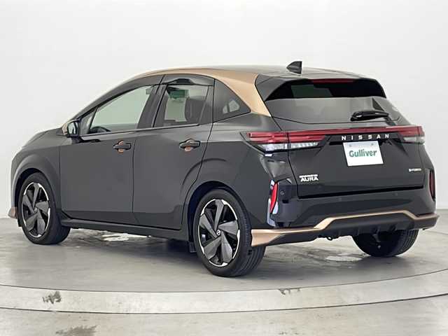 日産 オーラ G レザーエディション 宮城県 2021(令3)年 1.6万km ミッドナイトブラック/サンライズカッパー ワンオーナー　/メーカーＯＰ9インチナビ(AM/FM/フルセグTV/Apple CarPlay/Android　Auto)/ＢＯＳＥ　/アラウンドビューモニター　/ワイヤレス充電/プロパイロット/　・車線維持支援システム/　・標識認識機能/　・エマージェンシーブレーキ/　・ふらつき警報/　・オートマチックハイビーム/オートライト/LEDライト/インテリジェントルームミラー　/レザーシート　/レザーステアリング　/ビルトインＥＴＣ２．０　/前後コーナーセンサー　/純正前後ドラレコ/プッシュスタート/スマートキー/純正アルミホイール
