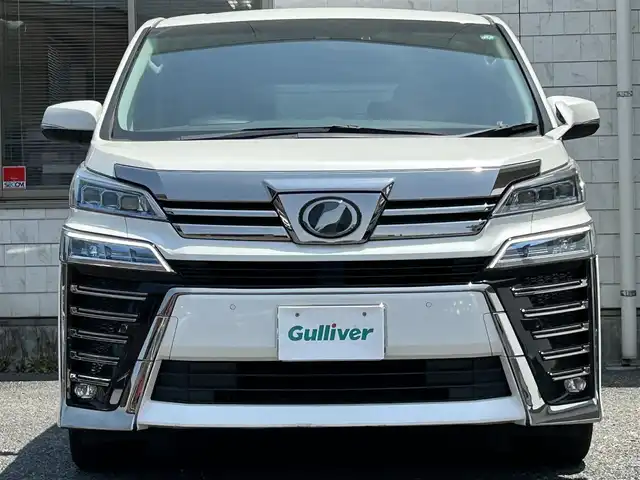 トヨタ ヴェルファイア Z Gエディション 福岡県 2019(令1)年 4万km ホワイトパールクリスタルシャイン ワンオーナー/純正10インチSDナビ【NSZN-Z68T】/(AM/FM/CD/DVD/Bluetooth/フルセグTV)/バックカメラ/黒レザーシート/純正12.1インチフリップダウンモニター【V12T-R68C】/トヨタセーフティーセンス/・プリクラッシュセーフティ/・車線逸脱警報/・オートマチックハイビーム/・ロードサインアシスト/・レーダークルーズコントロール/・先行車発進告知機能/横滑り防止装置/盗難防止装置/両側パワースライドドア/パワーバックドア/純正18インチアルミホイール/ドアバイザー/前方ドライブレコーダー【DRT-H68A】/ビルトインETC/ステアリングヒーター/シートヒーター＆ベンチレーター（D/N）/パワーシート(D/N)/シートメモリー(D)/プッシュスタート/ブレーキホールド/純正フロアマット/保証書/取扱説明書/ナビ取扱説明書/後席モニター取扱説明書