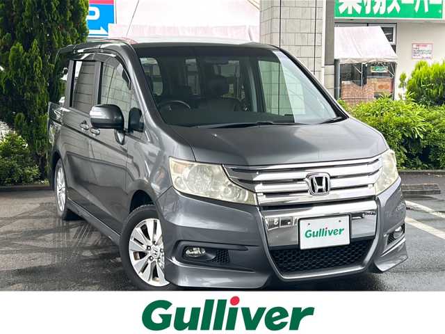 ホンダ ステップワゴン スパーダ Z 東京都 2010(平22)年 6.6万km ポリッシュドメタルメタリック HDD純正ナビ/・DVD/ワンセグTV/バックモニター/純正後席用モニター/両側パワースライドドア/純正フロアマット/ビルトインETC/純正アルミホイール/アンチブレーキングシステム/横滑り防止装置/盗難防止装置/衝突被害軽減システム/オートライト/Ｗエアバッグ/保証書・取扱説明書