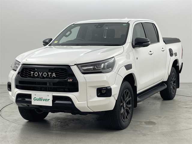 トヨタ ハイラックス Z GRスポーツ 福岡県 2023(令5)年 1万km スーパーホワイトⅡ ワンオーナー　/純正８型ナビ　/全方位カメラ　/純正ベッドライナー　/トノカバー　/ETC　/前後ドライブレコーダー　/レーダークルコン　/コーナーセンサー　/衝突被害軽減ブレーキ　/レーンキープ　/ヒルディセントコントロール　/パドルシフト　/ハーフレザーシート　/パワーシート