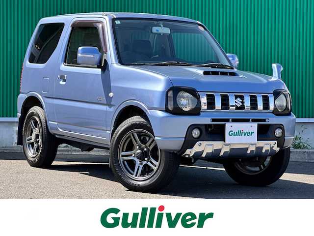 スズキ ジムニー クロスアドベンチャー 宮城県 2013(平25)年 7万km ブリーズブルーメタリック 4WD/社外オーディオ/合皮シート/D席シートヒーター/社外GPSレーダー/純正16インチAW/背面タイヤ/フォグライト/フロアマット/キーレス/ETC