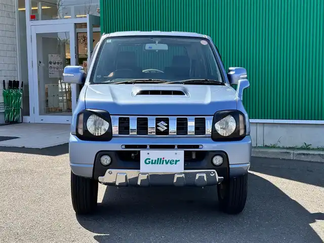 スズキ ジムニー クロスアドベンチャー 宮城県 2013(平25)年 7万km ブリーズブルーメタリック 4WD/社外オーディオ/合皮シート/D席シートヒーター/社外GPSレーダー/純正16インチAW/背面タイヤ/フォグライト/フロアマット/キーレス/ETC