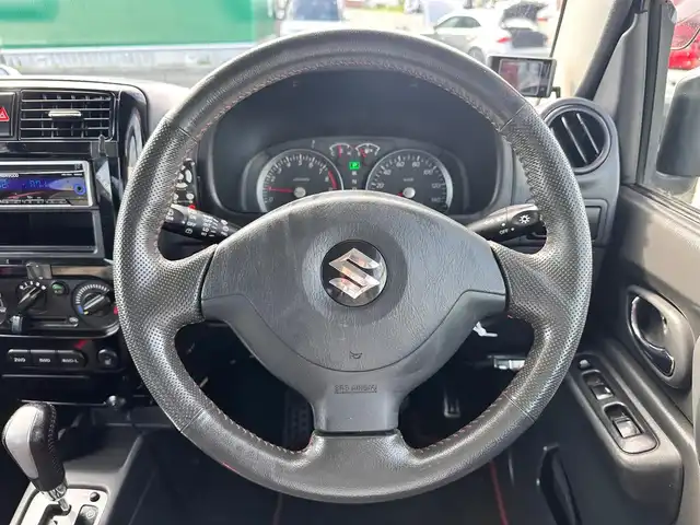 スズキ ジムニー クロスアドベンチャー 宮城県 2013(平25)年 7万km ブリーズブルーメタリック 4WD/社外オーディオ/合皮シート/D席シートヒーター/社外GPSレーダー/純正16インチAW/背面タイヤ/フォグライト/フロアマット/キーレス/ETC