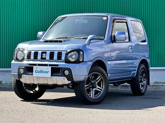スズキ ジムニー クロスアドベンチャー 宮城県 2013(平25)年 7万km ブリーズブルーメタリック 4WD/社外オーディオ/合皮シート/D席シートヒーター/社外GPSレーダー/純正16インチAW/背面タイヤ/フォグライト/フロアマット/キーレス/ETC