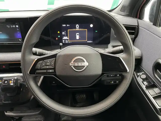 日産 サクラ X 鹿児島県 2023(令5)年 2.7万km ピンク 禁煙車　/社外ディスプレイオーディオ　/(Bluetooth/DVD/CD)　/バックカメラ/エマージェンシーブレーキ/踏み間違い衝突防止アシスト/車線逸脱防止支援システム/標識検知機能/先行車発進お知らせ/コーナーセンサー　/電動パーキングブレーキ　/オートホールド　/スマートキー　/プッシュスタート　/LEDヘッドライト　/純正アルミホイール/純正フロアマット/カラーコード：X42P59
