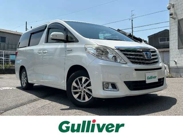 トヨタ アルファードハイブリット G Lパッケージ 愛知県 2013(平25)年 3.3万km ホワイトパールクリスタルシャイン 純正HDDナビ/AMFM/BT/CD/USB/フルセグ/バックカメラ/ビルトインETC/純正フリップダウンモニター/サンルーフ/両側パワースライドドア/パワーバックドア/プッシュスタート/クリアランスソナー/レザーシート/シートヒーター/パワーシート/メモリシート/クルーズコントロール/オットマン/純正16インチAW/HIDヘッドライト/純正フロアマット/保証書/取扱説明書