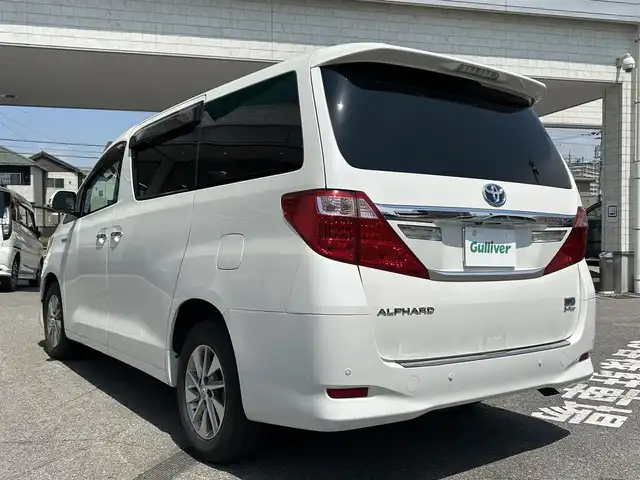 トヨタ アルファードハイブリット G Lパッケージ 愛知県 2013(平25)年 3.3万km ホワイトパールクリスタルシャイン 純正HDDナビ/AMFM/BT/CD/USB/フルセグ/バックカメラ/ビルトインETC/純正フリップダウンモニター/サンルーフ/両側パワースライドドア/パワーバックドア/プッシュスタート/クリアランスソナー/レザーシート/シートヒーター/パワーシート/メモリシート/クルーズコントロール/オットマン/純正16インチAW/HIDヘッドライト/純正フロアマット/保証書/取扱説明書