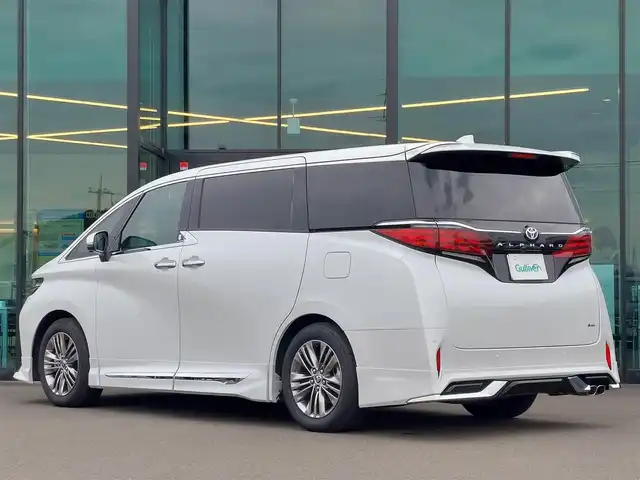 トヨタ アルファードハイブリット Z 東京都 2023(令5)年 1.3万km プラチナホワイトパールマイカ モデリスタエアロ/左右独立ムーンルーフ/後席13.2インチディスプレイ/両側パワースライドドア/12.3インチディスプレイオーディオ/パノラミックビューモニター/デジタルインナーミラー/ヘッドアップディスプレイ/パワーバックドア/ドライブレコーダー/ビルトインETC2.0/AC100V/トヨタセーフティセンス/・プリクラッシュセーフティ/・レーントレーシングアシスト/・レーダークルーズコントロール/・アダプティブハイビームシステム/・オートマチックハイビーム/・ブラインドスポットモニター/・クリアランスソナー