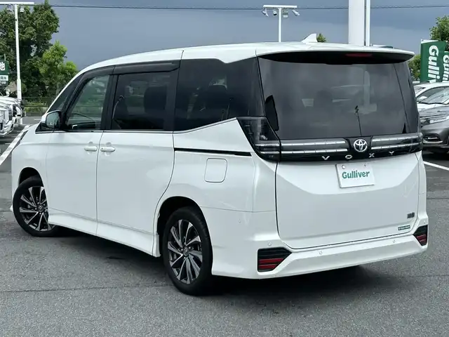 トヨタ ヴォクシー ハイブリッド S－Z 奈良県 2023(令5)年 1.5万km ホワイトパールクリスタルシャイン 純正１０．５インチナビ　/フルセグＴＶ　/BT/CD/DVD/USB/HDMI/両側パワースライドドア　/ワンオーナー　/ハーフレザーシート　/シートヒーター　/追従型クルーズコントロール　/全方位カメラ　/ＬＥＤヘッドライト　/オートライト/オートマチックハイビーム/前後コーナーセンサー/トヨタセーフティーセンス/スマートキー/純正17インチアルミホイール/純正フロアマット/AUTOHOLD