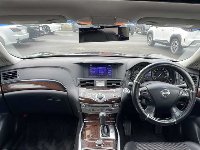 日産 フーガ 250GT 山口県 2012(平24)年 13.7万km 黒 サンルーフ/純正HDDナビ（ワンセグTV、AM/FM、Bluetooth）/バック＆サイドカメラ/クルーズコントロール/HIDオートライト/ハーフレザーシート/前席パワーシート/助手席オットマン/純正18インチアルミホイール/横滑り防止装置/W＋サイドエアバック/カーテンエアバック