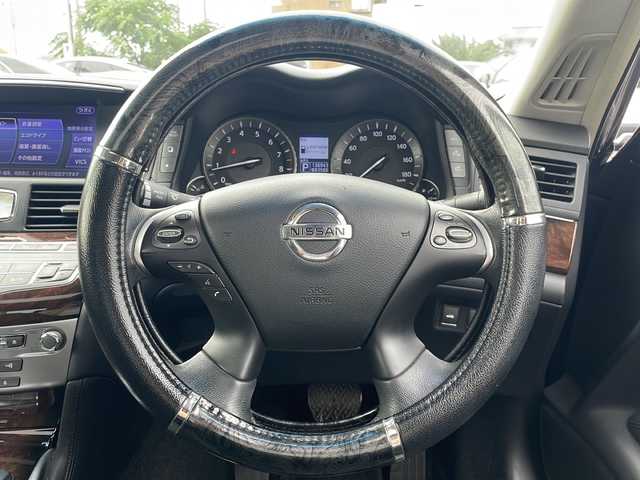 日産 フーガ 250GT 山口県 2012(平24)年 13.7万km 黒 サンルーフ/純正HDDナビ（ワンセグTV、AM/FM、Bluetooth）/バック＆サイドカメラ/クルーズコントロール/HIDオートライト/ハーフレザーシート/前席パワーシート/助手席オットマン/純正18インチアルミホイール/横滑り防止装置/W＋サイドエアバック/カーテンエアバック