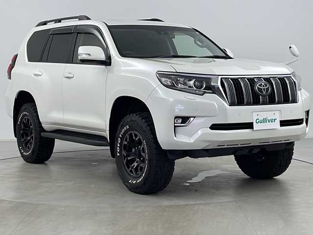 トヨタ ランドクルーザー プラド TX 道央・札幌 2023(令5)年 2.1万km ホワイトパールクリスタルシャイン ・4WD/・寒冷地仕様/・社外ナビ&CD&DVD&BT&SD/・サンルーフ/・トヨタセーフティセンス/・アダプティブクルーズコントロール/・横滑り防止装置/・社外前後ドライブレコーダー/・ビルトインETC/・電動格納ミラー/・ドアミラーヒーター/・社外フロアマット/・社外サスリフトアップ/・LEDヘッドライト/・オートライト/・オートマチックハイビーム/・スマートキー