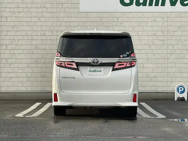 トヨタ ヴェルファイア Z Gエディション 福岡県 2018(平30)年 5.7万km ホワイトパールクリスタルシャイン 純正10型SDナビ(フルセグTV/CD/DVD/BT)/バックカメラ/コーナーセンサー/後席フリップダウンモニター/ドラレコ/ETC/シートヒーター/エアシート/ハンドルヒーター/USB/HDMI/クルコン/電動リア/純正フロアマット/純正LED/純正アルミホイール/プッシュスタート/スマートキー