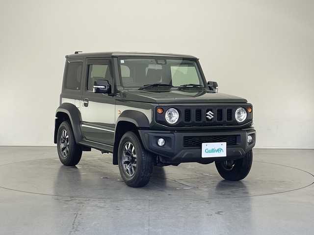 スズキ ジムニー シエラ JC 長野県 2019(平31)年 3.7万km ジャングルグリーン 4WD/5速MT/社外ディスプレイオーディオ(PVH-9300DVSZS)/クルーズコントロール/車線逸脱警報/衝突軽減ブレーキ/ダウンヒルアシストコントロール/前席シートヒーター/ステアリングスイッチ/ビルトインETC2.0/LEDヘッドライト/オートライト/フロントフォグランプ/電動格納ミラー/ウィンカーミラー/ドアミラーヒーター/純正15インチAW装着/純正ドアバイザー/プッシュスタート/スマートキー