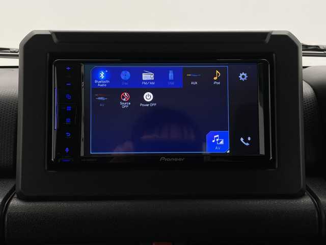 スズキ ジムニー シエラ JC 長野県 2019(平31)年 3.7万km ジャングルグリーン 4WD/5速MT/社外ディスプレイオーディオ(PVH-9300DVSZS)/クルーズコントロール/車線逸脱警報/衝突軽減ブレーキ/ダウンヒルアシストコントロール/前席シートヒーター/ステアリングスイッチ/ビルトインETC2.0/LEDヘッドライト/オートライト/フロントフォグランプ/電動格納ミラー/ウィンカーミラー/ドアミラーヒーター/純正15インチAW装着/純正ドアバイザー/プッシュスタート/スマートキー