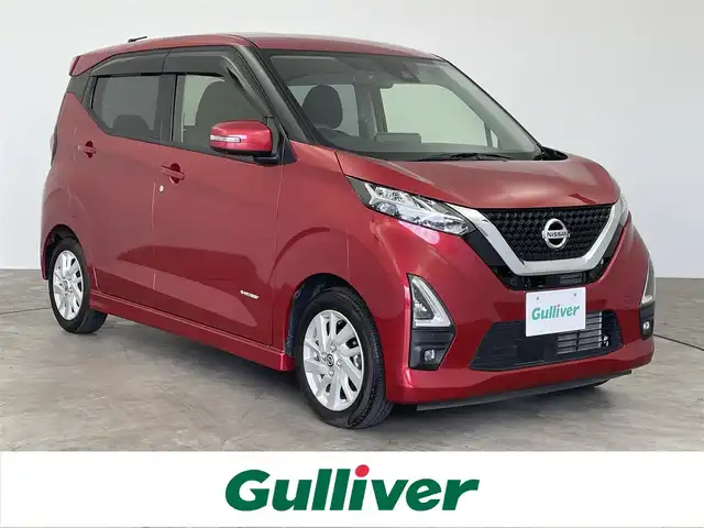 日産 デイズ ハイウェイスターX 大分県 2021(令3)年 0.9万km スパークリングレッドM 純正９型ナビ（MM321D-L）/ＢＴ/フルセグＴＶ/CD/DVD　/全方位カメラ　/前後ドライブレコーダー　/アラウンドビューモニター/コーナーセンサー　/エマージェンシーブレーキ　/ステアリングスイッチ/スマートキー/スペアキー/ベンチシート/先行車発進お知らせ　/純正１４インチアルミホイール　/ＬＥＤヘッドライト
