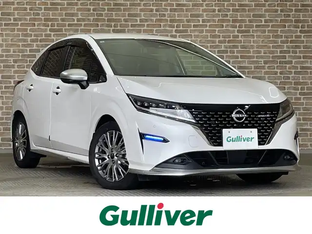 日産 ノート オーテック FOUR 岩手県 2021(令3)年 5万km ピュアホワイトパール ・４WD/・衝突軽減ブレーキ/・プロパイロット/・純正ディスプレイオーディオ/　BT＆USB＆HDMI＆TV/・全方位カメラ/・バックカメラ/・シートヒーター/・ステアリングヒーター/・ブラインドスポットモニター/・置くだけ充電/・ビルトインETC/・オートエアコン/・オートライト/・オートリトラミラー/・社外レーダー/・前方ドライブレコーダー/・プッシュスタート/・スマートキー/・デジタルインナーミラー/・純正フロアマット/・ドアバイザー/・ウィンカーミラー/・フォグライト/・スペアキー