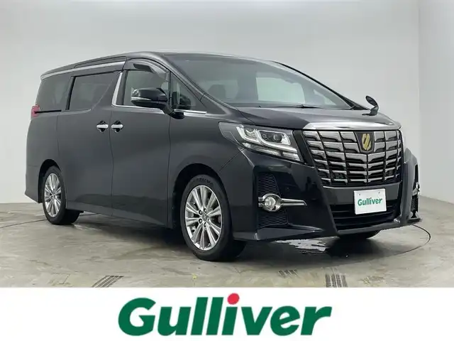 トヨタ アルファード S Aパッケージ タイプブラック 岡山県 2017(平29)年 5.9万km ブラック アルパインビックX9インチナビ(X9Z)/　(フルセグTV/BT/CD/DVD/MSV/HDMI)/アルパイン12.8インチフリップダウンモニター/両側電動スライドドア/電動リアゲート/前後コーナーセンサー/バックカメラ/衝突軽減ブレーキシステム/100V電源/踏み間違い防止/社外前後ドラレコ/ビルトインETC/スマートキー/純正18インチAW/LEDヘッドライト/オートブレーキホールド/オートライト/ウッドコンビステアリング/ステアリングスイッチ/チルトステアリング/シートリフター/ウィンカーミラー/フロアマット/ドアバイザー/横滑り防止/7人乗り