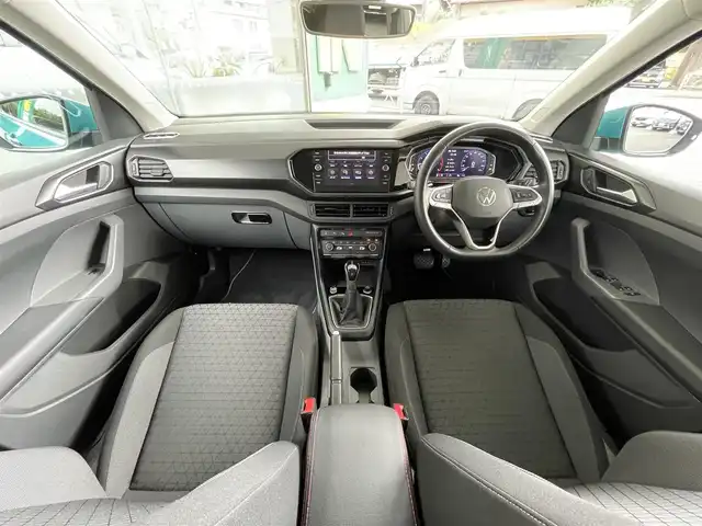 フォルクスワーゲン Ｔ－クロス TSI 1st 東京都 2020(令2)年 2万km ライトブルー 純正SDナビ（Discovery Media）/・Bluetoothオーディオ/USBオーディオ/オールインセーフティ/・アダプティブクルーズコントロール/・バックカメラ/・ブラインドスポットディテクション/・駐車支援システム/・コーナーセンサー（前後）/フルデジタルメーター/スマートフォンワイヤレスチャージング/取扱説明書/保証書/スペアキー1本