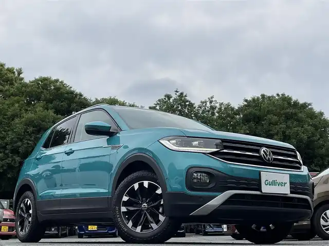 フォルクスワーゲン Ｔ－クロス TSI 1st 東京都 2020(令2)年 2万km ライトブルー 純正SDナビ（Discovery Media）/・Bluetoothオーディオ/USBオーディオ/オールインセーフティ/・アダプティブクルーズコントロール/・バックカメラ/・ブラインドスポットディテクション/・駐車支援システム/・コーナーセンサー（前後）/フルデジタルメーター/スマートフォンワイヤレスチャージング/取扱説明書/保証書/スペアキー1本
