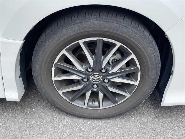 トヨタ ヴォクシー ZS 香川県 2015(平27)年 4.7万km 白 ワンオーナー/3列シート8人乗り/片側パワースライドドア/ナビ(NSZT-Y62G)/Bluetoothオーディオ/地デジ/ダウンサス/スマートキー2本/保証書/取扱説明書/アイドリングストップ/バックカメラ/純正フリップダウンモニター