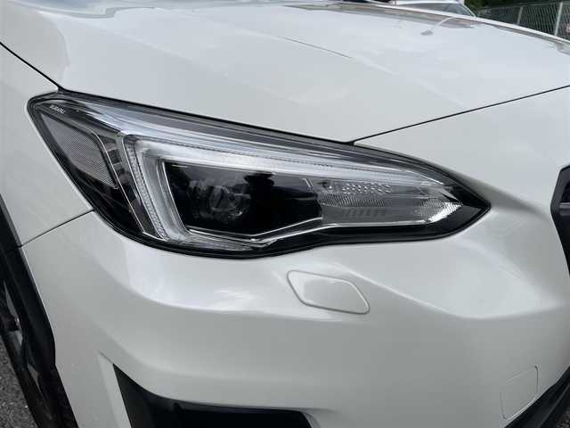 スバル ＸＶ ハイブリッド 2．0e－S アイサイト 神奈川県 2020(令2)年 5万km クリスタルホワイトP ワンオーナー/AWD/純正メモリーナビ/　○フルセグTV/　○BT/AM/FM/SD/バック＆サイドカメラ/ツーリングアシスト/　○全車速追従機能付クルーズコントロール/　○車線中央維持＆先行車追従操舵機能/レーンキープアシスト/車線逸脱警報/ふらつき警報/先行車発進お知らせ/後退時ブレーキアシスト/誤発進誤後進抑制制御/前席パワーシート（運転席メモリ付）/革巻きステアリング/パドルシフト/スマートキー　2本/プッシュスタート/ETC/LEDヘッドライト/フォグランプ/バックセンサー/純正フロアマット/保証書/取扱説明書