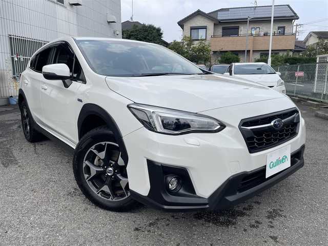 スバル ＸＶ ハイブリッド 2．0e－S アイサイト 神奈川県 2020(令2)年 5万km クリスタルホワイトP ワンオーナー/AWD/純正メモリーナビ/　○フルセグTV/　○BT/AM/FM/SD/バック＆サイドカメラ/ツーリングアシスト/　○全車速追従機能付クルーズコントロール/　○車線中央維持＆先行車追従操舵機能/レーンキープアシスト/車線逸脱警報/ふらつき警報/先行車発進お知らせ/後退時ブレーキアシスト/誤発進誤後進抑制制御/前席パワーシート（運転席メモリ付）/革巻きステアリング/パドルシフト/スマートキー　2本/プッシュスタート/ETC/LEDヘッドライト/フォグランプ/バックセンサー/純正フロアマット/保証書/取扱説明書