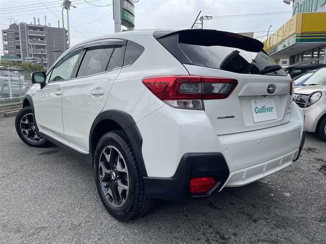 スバル ＸＶ ハイブリッド 2．0e－S アイサイト 神奈川県 2020(令2)年 5万km クリスタルホワイトP ワンオーナー/AWD/純正メモリーナビ/　○フルセグTV/　○BT/AM/FM/SD/バック＆サイドカメラ/ツーリングアシスト/　○全車速追従機能付クルーズコントロール/　○車線中央維持＆先行車追従操舵機能/レーンキープアシスト/車線逸脱警報/ふらつき警報/先行車発進お知らせ/後退時ブレーキアシスト/誤発進誤後進抑制制御/前席パワーシート（運転席メモリ付）/革巻きステアリング/パドルシフト/スマートキー　2本/プッシュスタート/ETC/LEDヘッドライト/フォグランプ/バックセンサー/純正フロアマット/保証書/取扱説明書