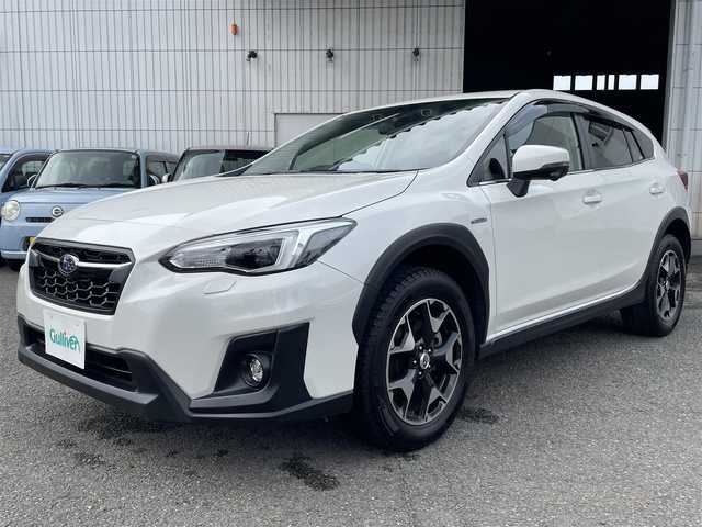 スバル ＸＶ ハイブリッド 2．0e－S アイサイト 神奈川県 2020(令2)年 5万km クリスタルホワイトP ワンオーナー/AWD/純正メモリーナビ/　○フルセグTV/　○BT/AM/FM/SD/バック＆サイドカメラ/ツーリングアシスト/　○全車速追従機能付クルーズコントロール/　○車線中央維持＆先行車追従操舵機能/レーンキープアシスト/車線逸脱警報/ふらつき警報/先行車発進お知らせ/後退時ブレーキアシスト/誤発進誤後進抑制制御/前席パワーシート（運転席メモリ付）/革巻きステアリング/パドルシフト/スマートキー　2本/プッシュスタート/ETC/LEDヘッドライト/フォグランプ/バックセンサー/純正フロアマット/保証書/取扱説明書