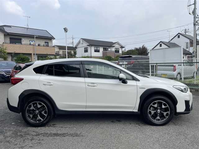 スバル ＸＶ ハイブリッド 2．0e－S アイサイト 神奈川県 2020(令2)年 5万km クリスタルホワイトP ワンオーナー/AWD/純正メモリーナビ/　○フルセグTV/　○BT/AM/FM/SD/バック＆サイドカメラ/ツーリングアシスト/　○全車速追従機能付クルーズコントロール/　○車線中央維持＆先行車追従操舵機能/レーンキープアシスト/車線逸脱警報/ふらつき警報/先行車発進お知らせ/後退時ブレーキアシスト/誤発進誤後進抑制制御/前席パワーシート（運転席メモリ付）/革巻きステアリング/パドルシフト/スマートキー　2本/プッシュスタート/ETC/LEDヘッドライト/フォグランプ/バックセンサー/純正フロアマット/保証書/取扱説明書