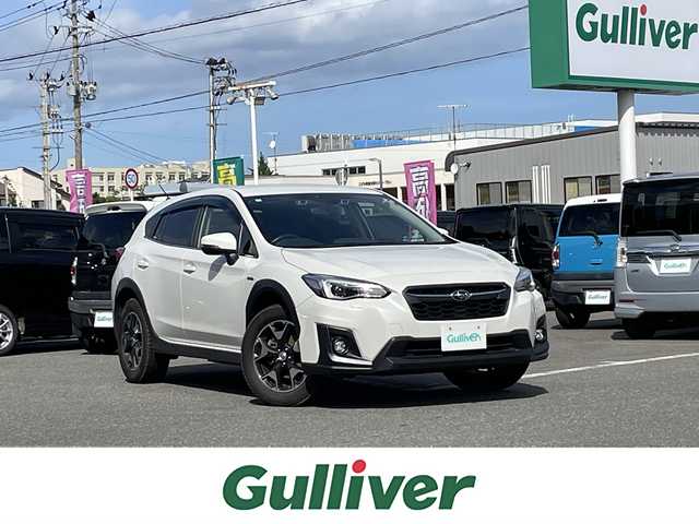スバル ＸＶ ハイブリッド 2．0e－S アイサイト 青森県 2020(令2)年 5万km クリスタルホワイトP ワンオーナー/AWD/純正メモリーナビ/　○フルセグTV/　○BT/AM/FM/SD/バック＆サイドカメラ/ツーリングアシスト/　○全車速追従機能付クルーズコントロール/　○車線中央維持＆先行車追従操舵機能/レーンキープアシスト/車線逸脱警報/ふらつき警報/先行車発進お知らせ/後退時ブレーキアシスト/誤発進誤後進抑制制御/前席パワーシート（運転席メモリ付）/革巻きステアリング/パドルシフト/スマートキー　2本/プッシュスタート/ETC/LEDヘッドライト/フォグランプ/バックセンサー/純正フロアマット/保証書/取扱説明書